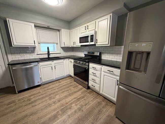 Primary Photo - Spacious 4-Bedroom Home with First-Floor Convenience and Great Outdoor Space