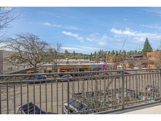 Building Photo - Main Street Living with Granite Kitchen, Gas Fireplace, and MAX Line Access