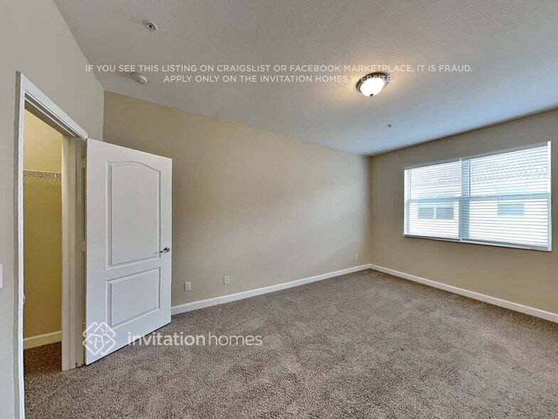 Building Photo - 9495 SW Merlin Ct