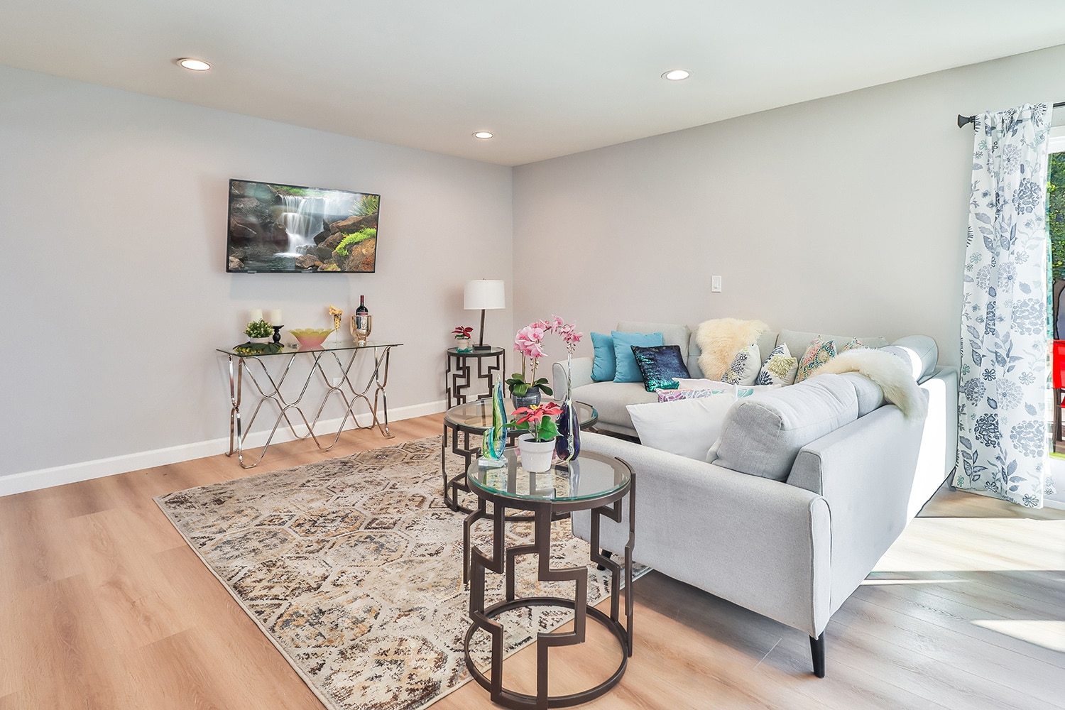 living room with flat screen TV - 8520 Jumilla Ave