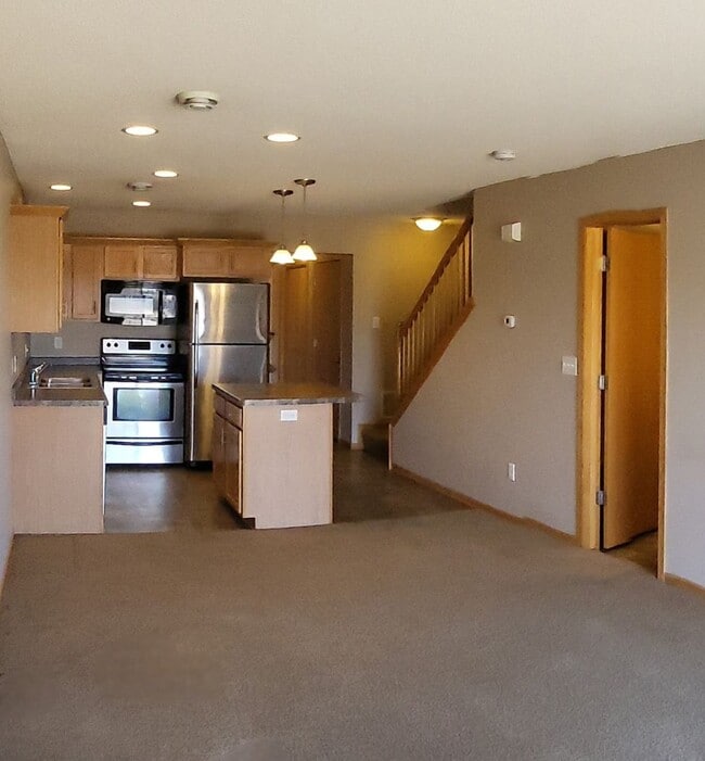 Building Photo - Move in August 8, 2025, and get August ren...