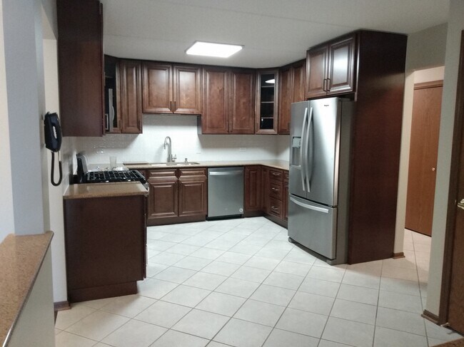 Building Photo - 6441 W Warner Ave