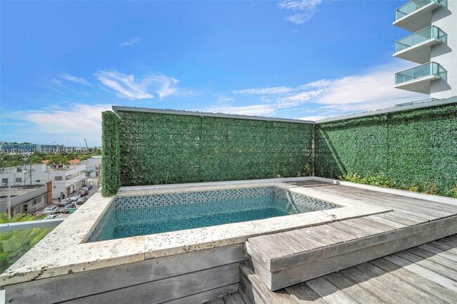 Building Photo - 9501 Collins Ave