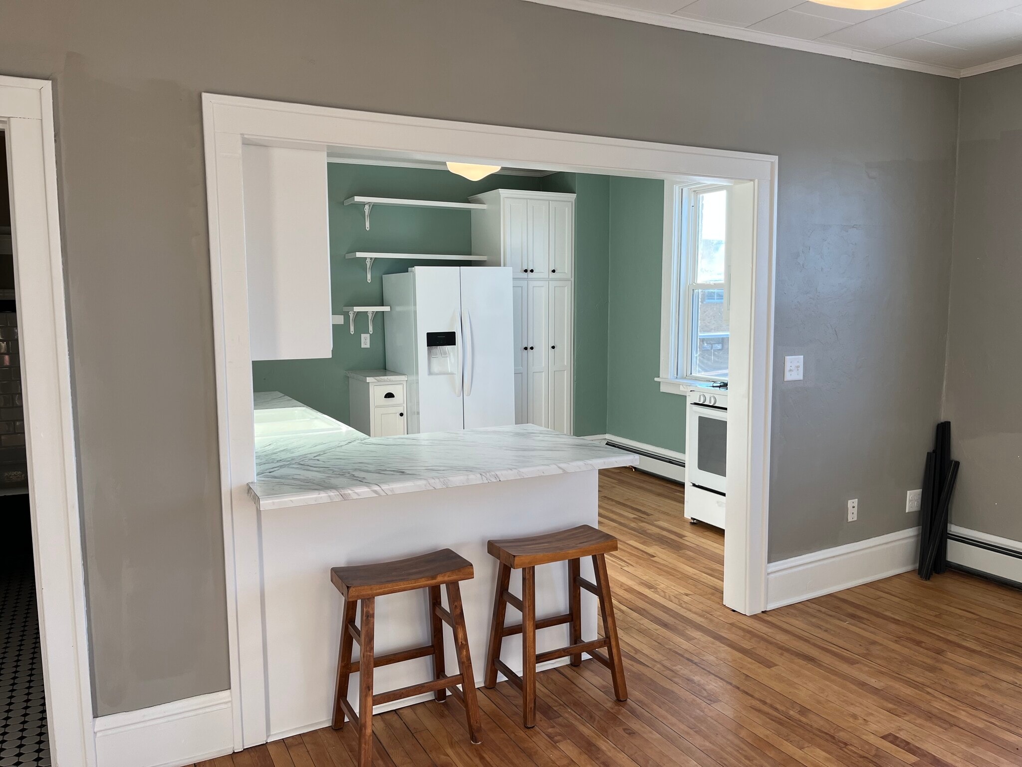 Kitchen From Dining - 415 E Saint Germain St