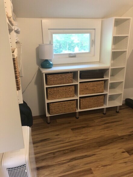 Large walk in closet opposite primary bedroom - 46 Wilmot Center Rd