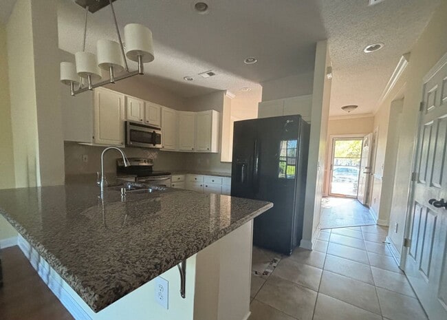 Building Photo - Available June 1st. Gorgeous 3 BR/2 BA Home Available in Desirable Whitney Lakes!