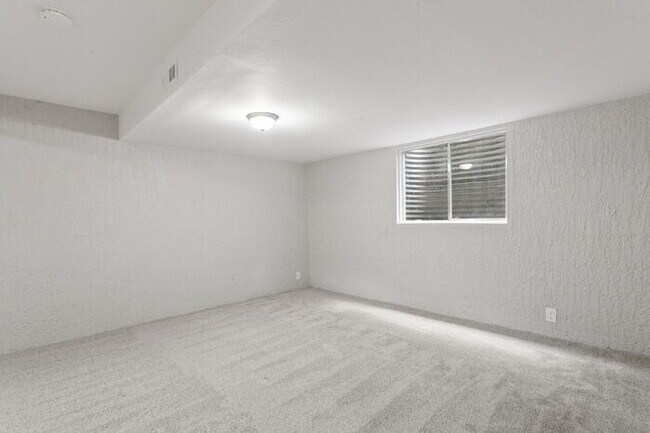 Building Photo - Freshly Renovated 4-Bedroom Home with Over...