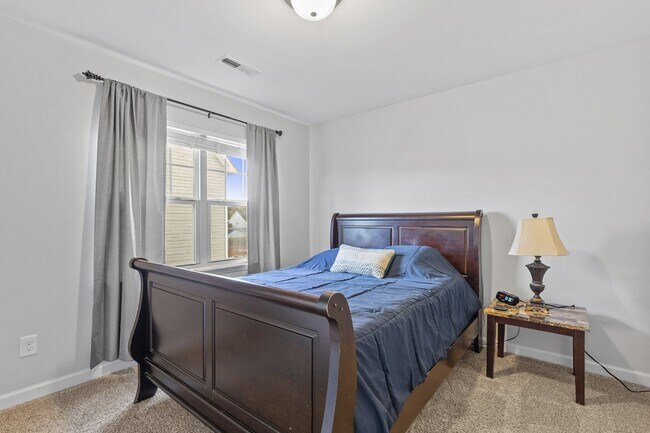 Building Photo - 3 Bedroom + Bonus Room Home with Main Floor Primary Suite & Community Pool Access