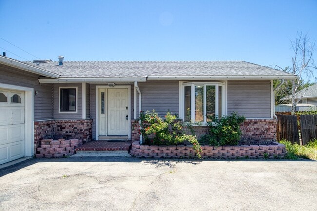 Building Photo - One Story Home with Large Detached Garage too