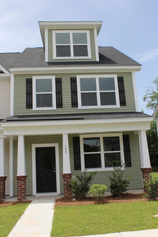 Building Photo - Sun-Filled 3-Story End-Unit Townhome with Fenced Yard, Storage & Resort-Style Pool