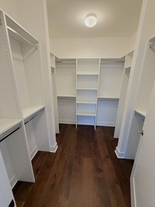 Building Photo - Brand new 4 level, 4 Bedroom Townhome with Elevator!