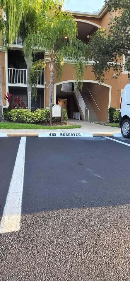 assigned parking right in front of apartment entrance - 1875 Florida Club Dr