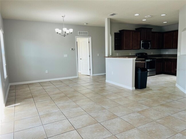 Building Photo - 6562 S Goldenrod Rd