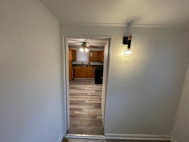 The third bedroom/den off the kitchen is conveniently on the first floor - 212 Lorenz Ave