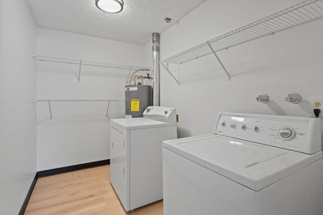 Building Photo - Spacious And Nicely Updated 2 bed 1 Bath Condo unit w/ full size laundry