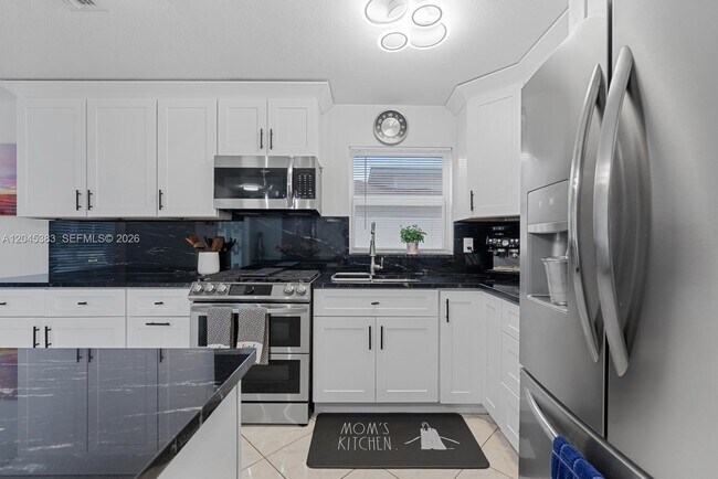 Building Photo - 9508 N Military Trl