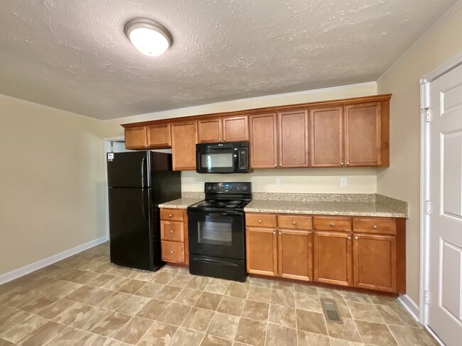 Building Photo - 2br,1ba w/ carport and detached storage bu...