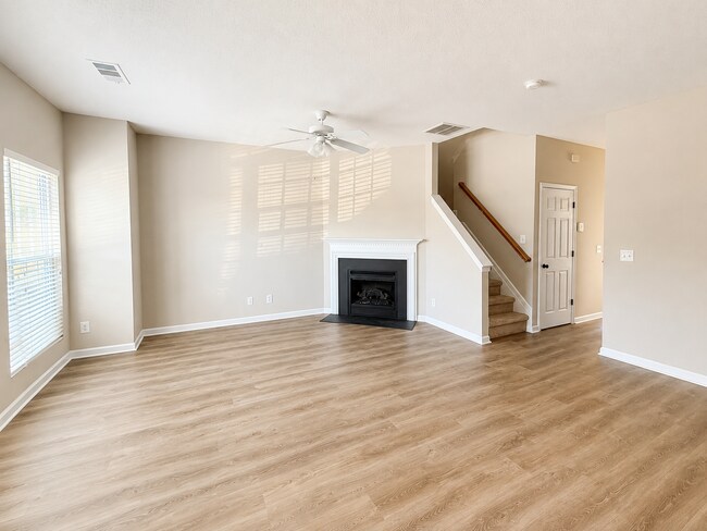 Building Photo - Beautiful 3-Bedroom Townhome with Pond View | Lawn Care Included | Convenient Whitsett Location