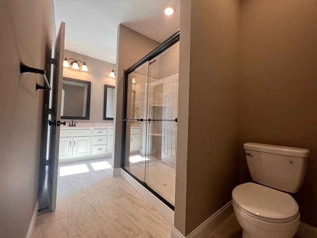 Building Photo - New condo 2 bedroom, 2 bath, 2 car garage