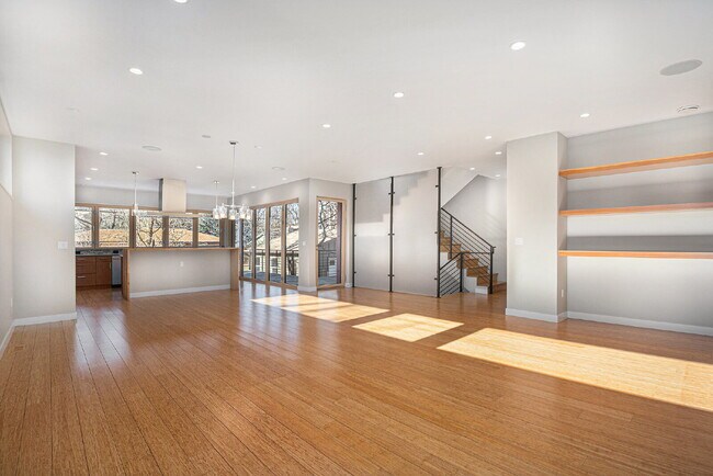 Building Photo - "Modern 4-Bed Boulder Retreat with Granite Elegance & Finished Basement!"