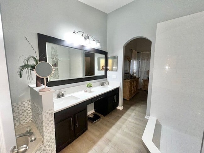 Building Photo - Lake Nona!! Spectacular 4X2 in Gated Nona Crest! All tile flooring!! 2 car garage! Move in April ...