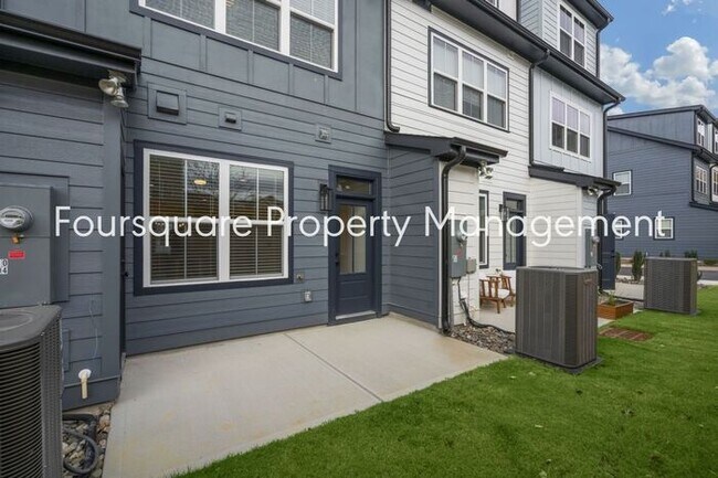 Building Photo - Modern 4-Bed / 3.5-Bath Townhome with Main Level Hard-Surface Floors , Back Patio – Easy Access t...