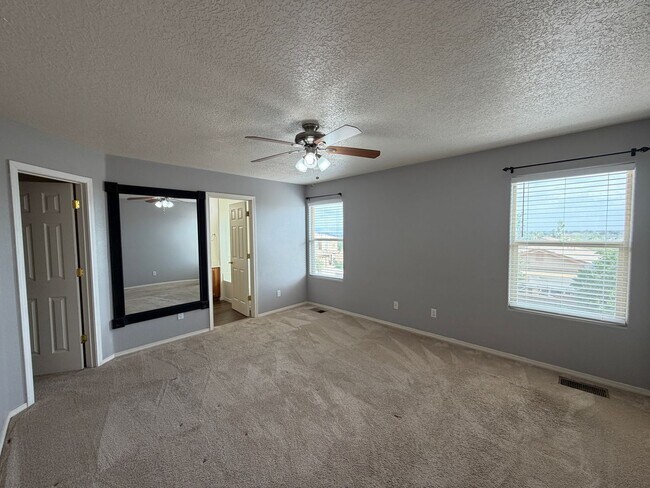 Building Photo - 4 Bedroom Home Available Near McMahon Blvd NW & Universe Blvd NW!