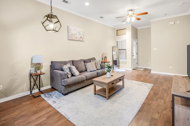 Building Photo - AUGUST PRE-LEASE Spacious 3 Bedroom 2.5 Bathroom Townhome with Covered Parking