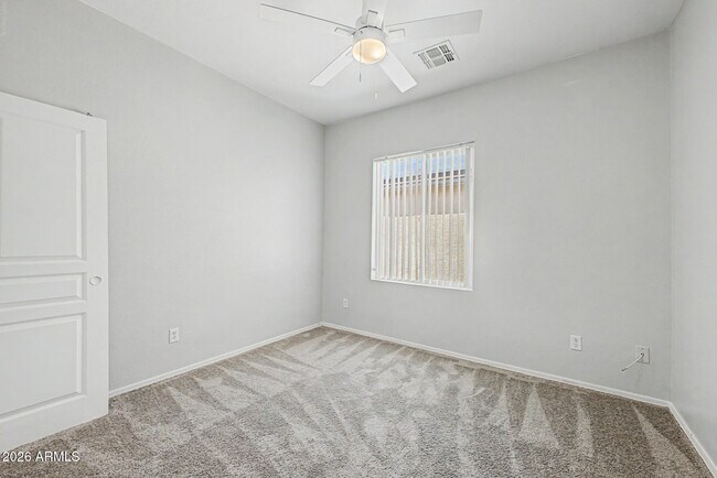 Building Photo - 9442 W Palm Ln