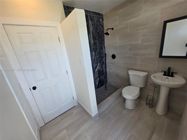 Building Photo - 120 NE 10th Ave