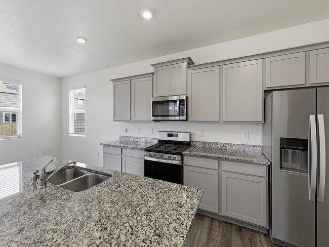 Building Photo - Beautiful Home in Severance with 3-Car Garage, Fenced Yard, and Central A/C!