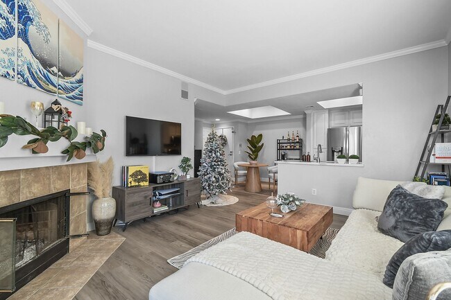 Building Photo - Remodeled River-View Corner Unit with Oversized Patio