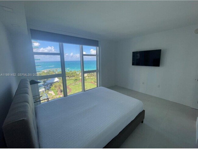 Building Photo - 10275 Collins Ave