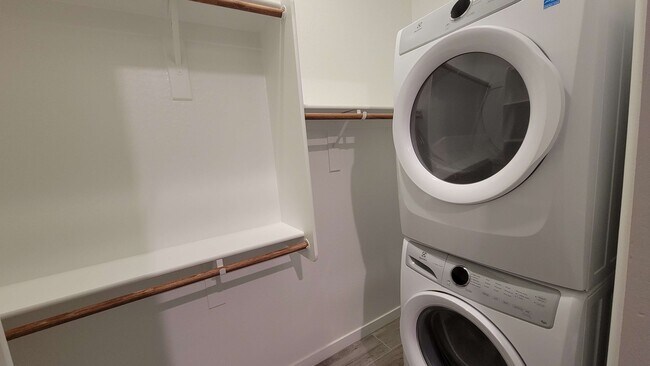 Walk-In Closet & Laundry Setup - 9741 E Tahoe Ave