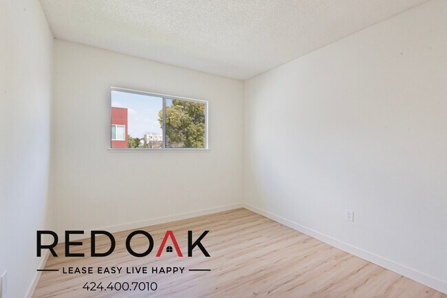 Building Photo - 1341 W 37th Pl