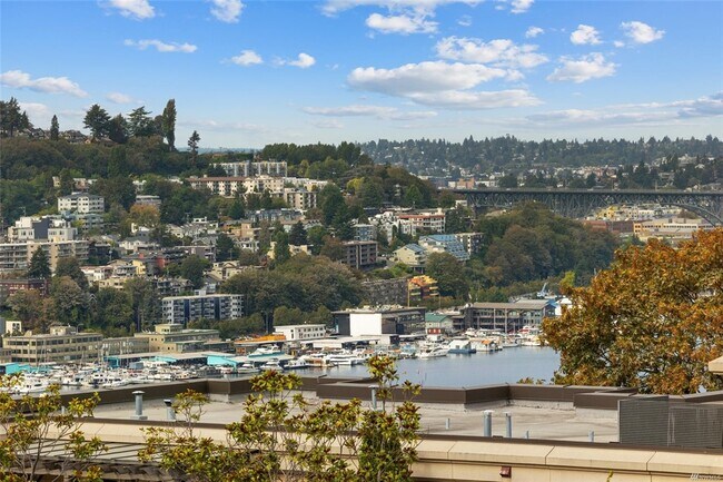 View of Queen Anne Hill and the bridge, Lake Union yacht moorings in the foreground - 730 Bellevue Ave E
