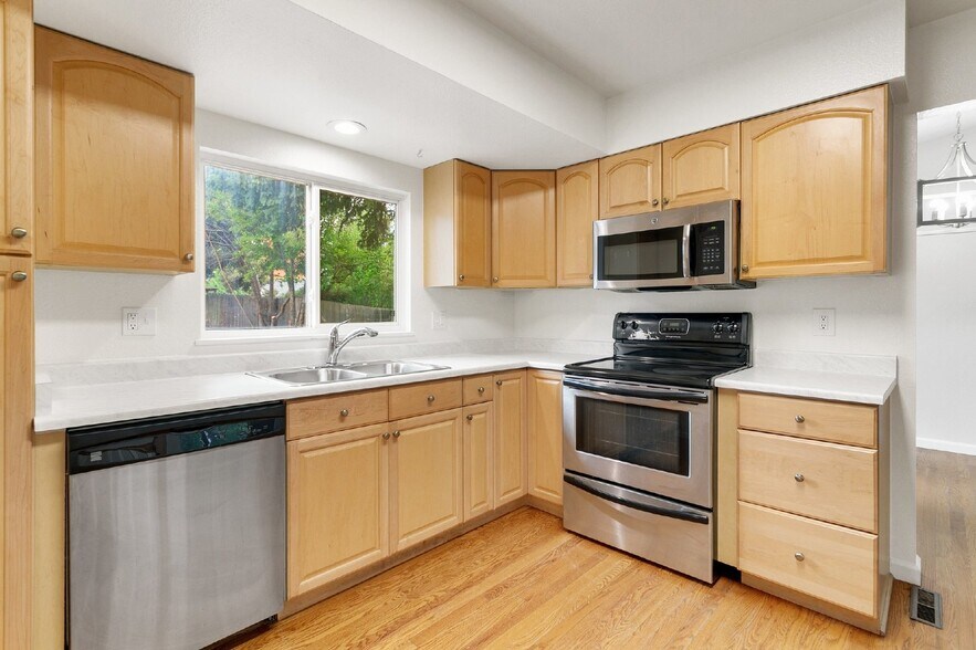 Building Photo - Renovated 4-Bedroom Home with Finished Bas...