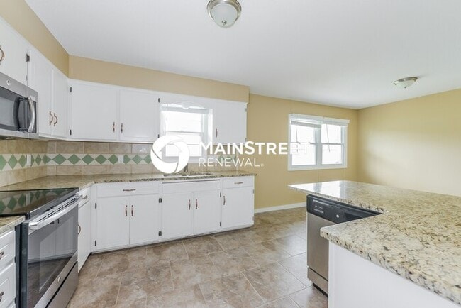 Building Photo - 4 Bedroom Pet-Friendly Home in Leavenworth, KS with Main Street Renewal