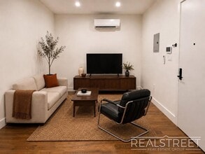 Building Photo - Modern Two-Bedroom with In-Unit Laundry and G Train Access — Available September 1