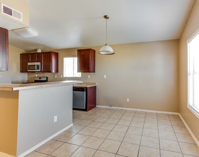 Building Photo - Charming Santa Fe style home in Tierra Del Este Subdivision.