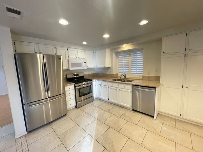 Building Photo - 9317 Magic Flower Ave