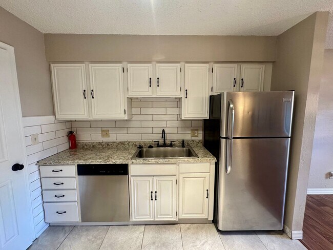 Building Photo - Updated CONDO in Rockrimmon with POOL, TENNIS and PICKLEBALL COURTS!