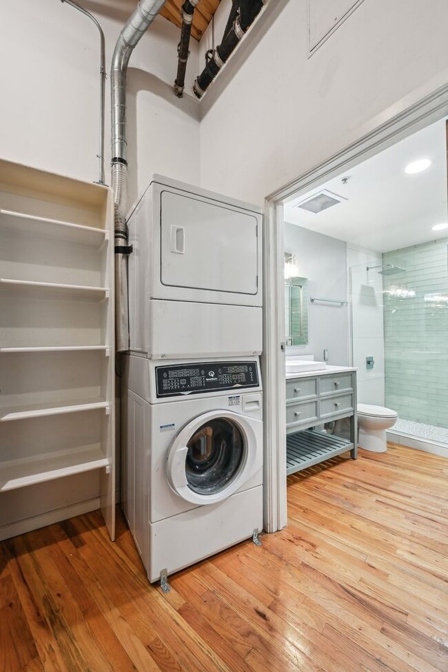 Building Photo - Open floor living at its best! 1 BR/2 BA l...