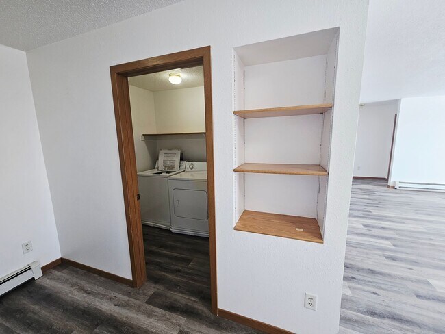 Building Photo - Fully Remodeled 1,250 Sq Ft 2 Bedroom Apartment with Garage, In-Unit Laundry & Private Balcony – ...