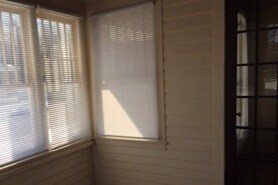 enclosed front porch - 108 S Rutland St