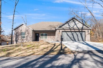 Building Photo - Welcome to this stunning 3-bedroom, 2-bathroom home that boasts a range of high-quality features ...