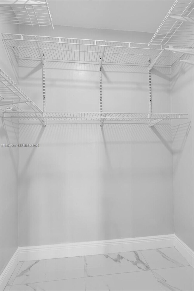 Building Photo - 5061 W 12th Ln