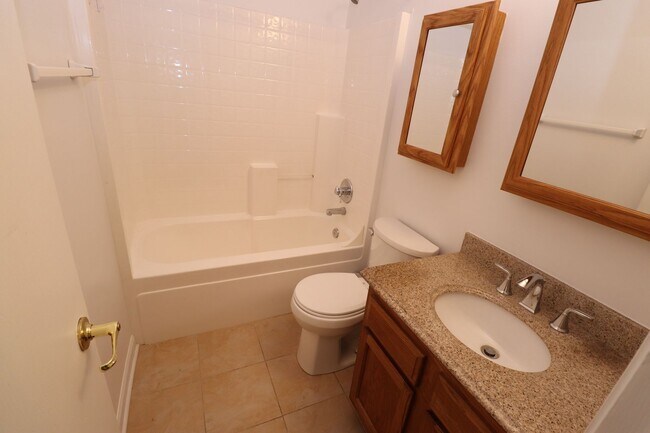 Building Photo - Discover this well-maintained 3-bedroom, 2-bath home in Indianapolis featuring an attached garage...