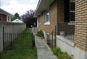 Building Photo - 3 BD. 1 BA. Granite Counters. Wood Floors