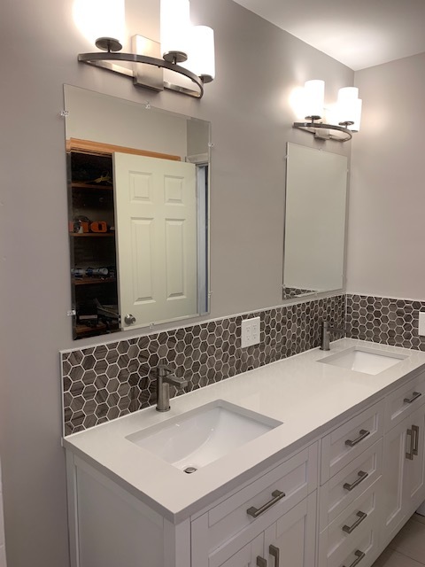 Updated main bath with double vanity and modern tile - 5206 Grandview Ln